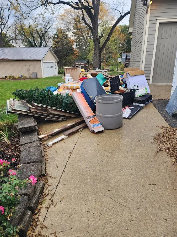 Dumpster being loaded with debris for Commercial Dumpster Rental in Kingfisher